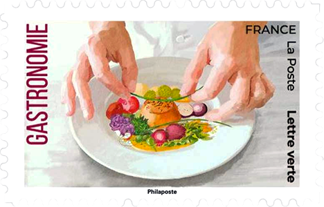 Illustration of a chef's hands arranging a plate with colorful vegetables and a small dish, featured on a French stamp labeled 'Gastronomie'.