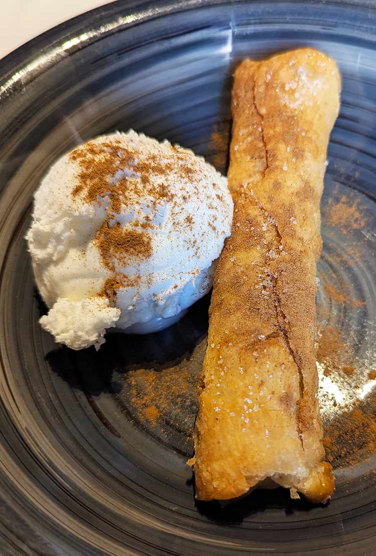 custard-filled cinnamon-dusted cana with meringue ice-cream at liberten restaurante