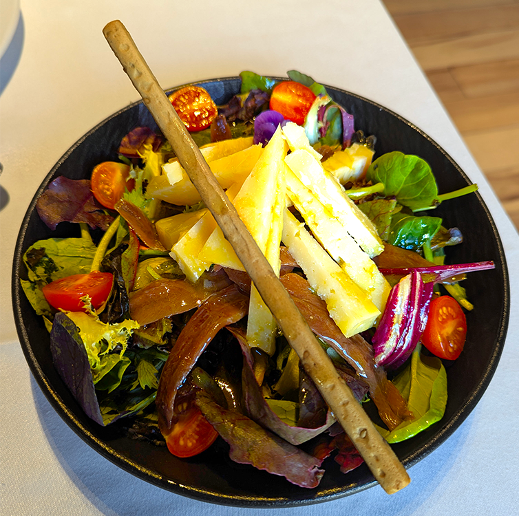 green salad with anchovies and sheep cheese at liberten restaurante