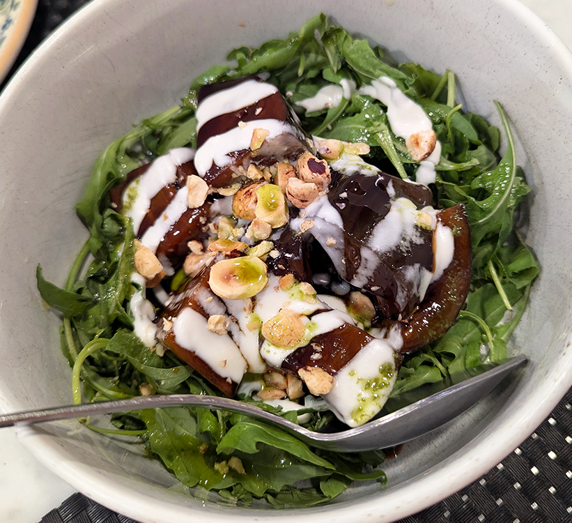 arugula salad with grilled eggplant and hazelnuts at portillo restaurante