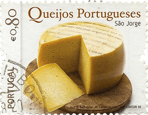 A Portuguese postage stamp featuring a wheel of São Jorge cheese with a wedge cut out, labeled 'Queijos Portugueses' and priced at €0.80.