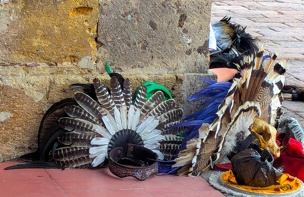 feather headwear of native american dancers outside of zapopan cathedral